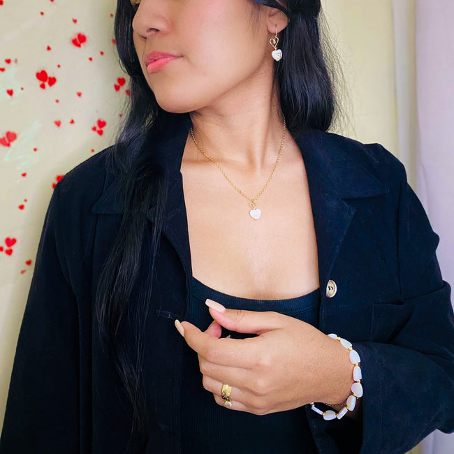 Be Mine mother of pearl and gold heart lever back earrings