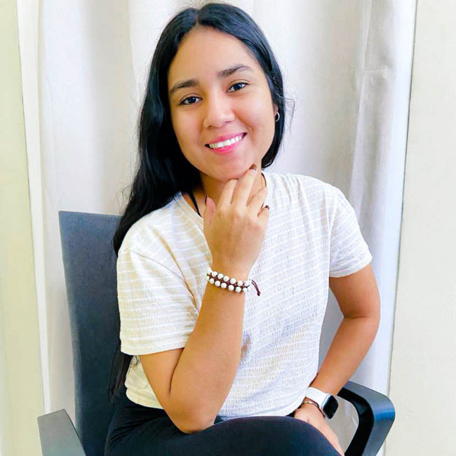 Cord of 3 cream howlite and brown cord adjustable bracelet